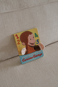 Count and Clap with Curious George: Finger Puppet Book