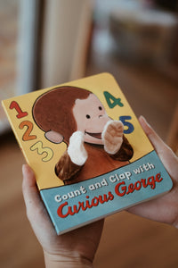Count and Clap with Curious George: Finger Puppet Book